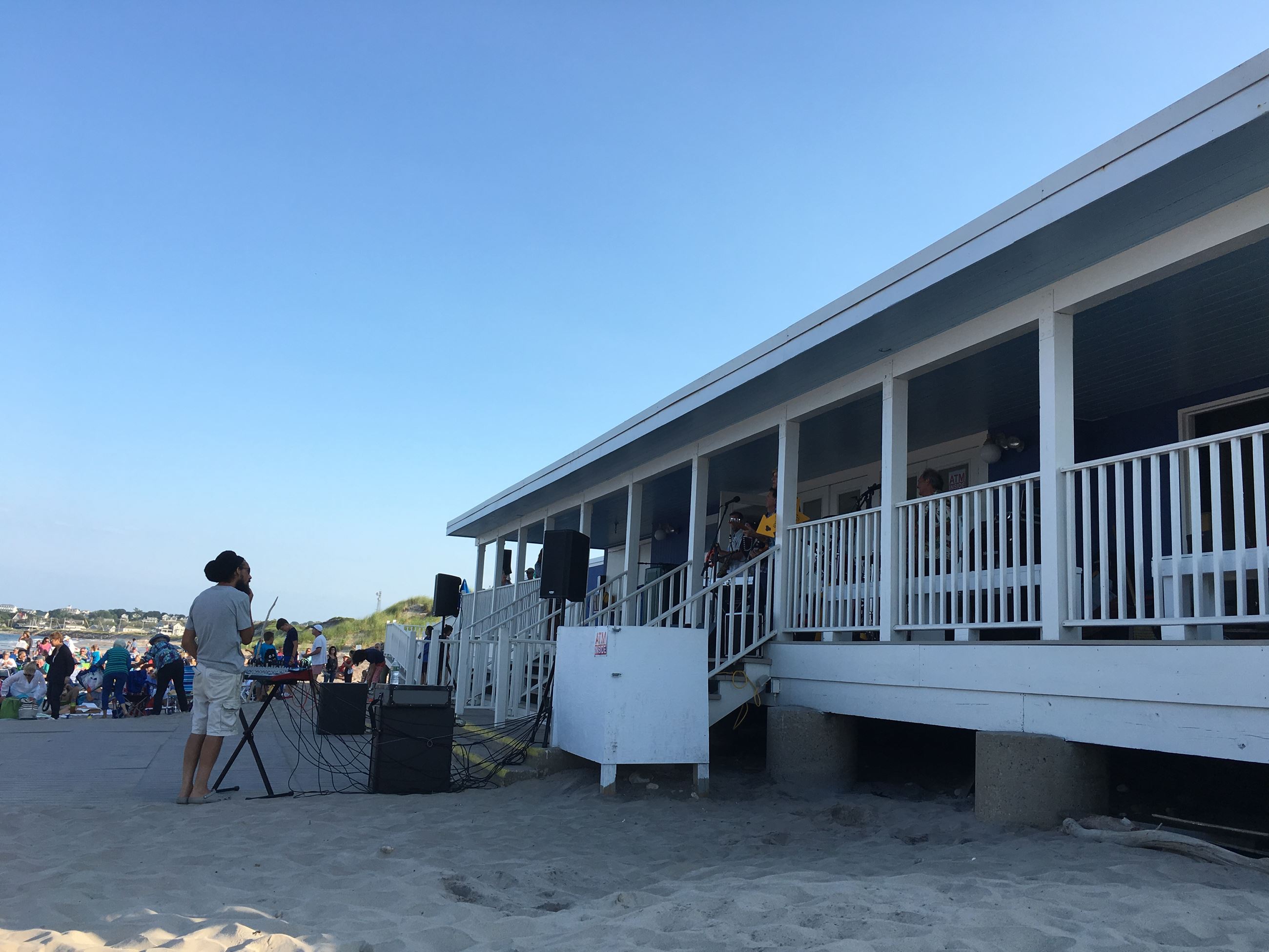 People at building on beach